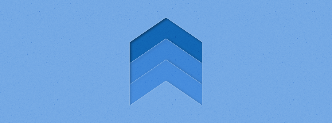 An image of three arrows pointing up, layered one on top of the other, with the top-most arrow in dark blue